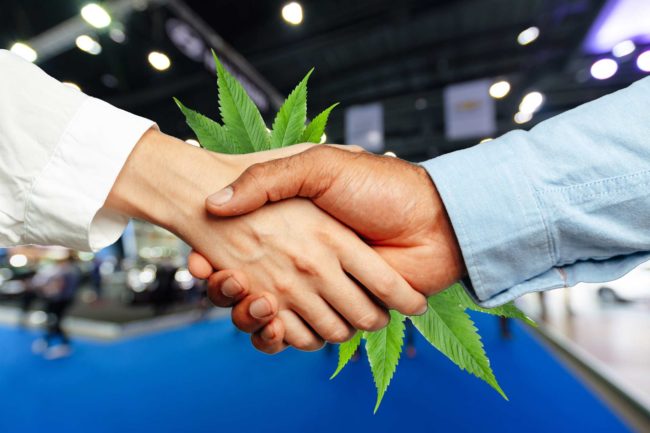 people handshaking at MJBiz Con