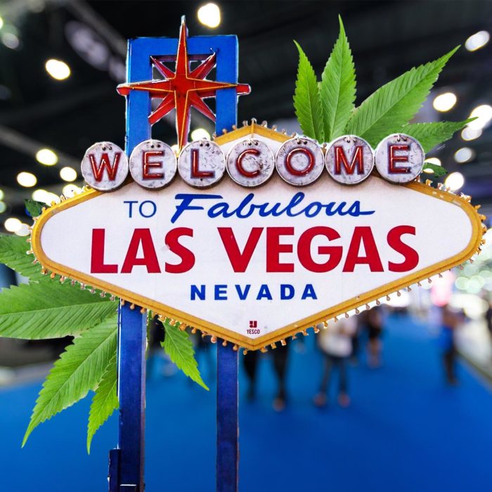 las vegas sign overtop a convention center
