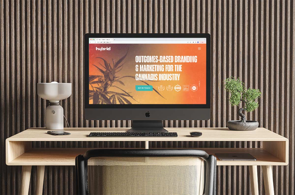 Hybrid Marketing Co. website depicted on desktop computer