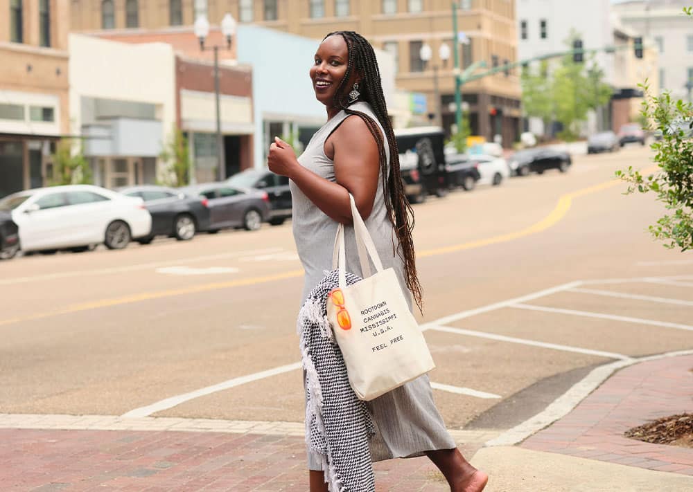 Rootdown Dispensary Customer with Tote